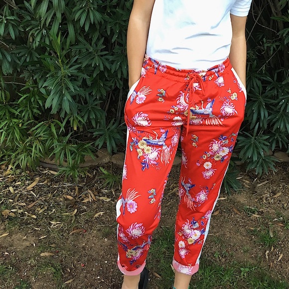 Red tracksuit pants with lining and bright print - Picture 1 of 4